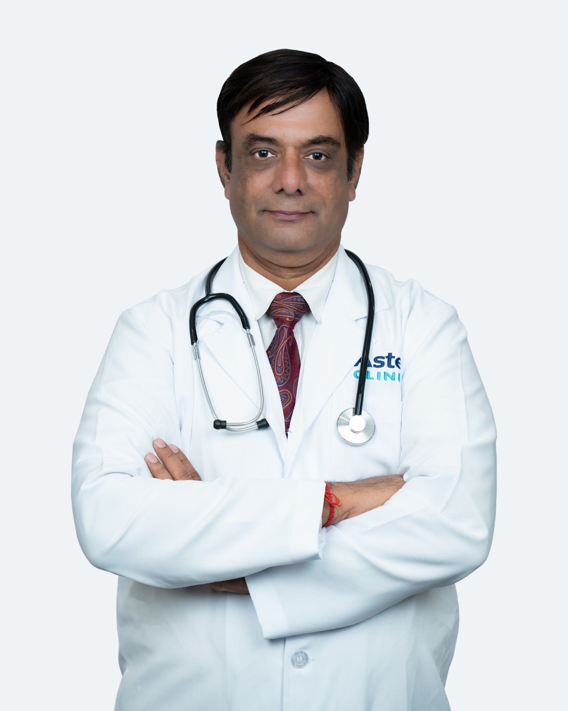 Dr. Mangesh
