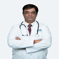 Dr. Mangesh