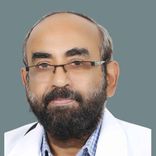 Dr.  Babu Daniel
